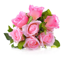 Artificial pink rose isolated on white background.