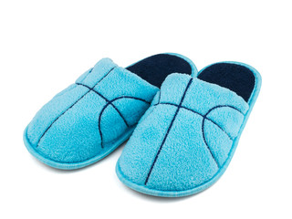 Dark blue embroidery on blue Slippers isolated on white background.