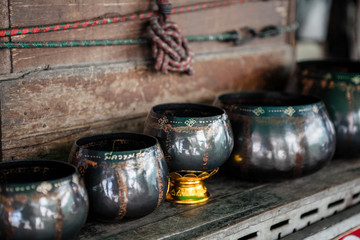 For over 200 hundred years a family community have been hand making traditional Buddhist Alms bowls from their homes in an area called Ban Bat, part of the old town of Bangkok, Thailand.