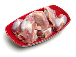 Raw Chicken gizzards on white background