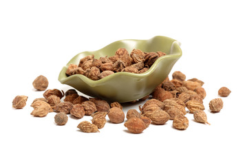 Seeds of black cardamom isolated on white background