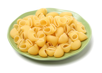 Italian pasta (Gomiti Rigati) on white background 