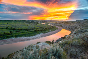 Sunset over the Little Missouri River and Wind Canyon, Theodore Roosevelt National Park, North...