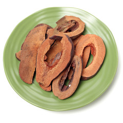 Slices of papaya isolated on white background