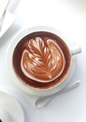hot chocolate in mug on White table background.  top view.