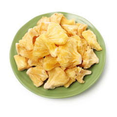 Dried pineapple rings on white background