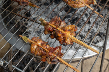 Thai grilled chicken is sold throughout the tourist route in Thailand