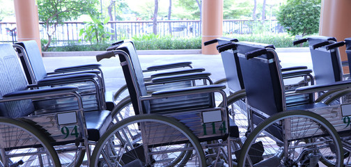 Group of wheelchairs in front of a hospital