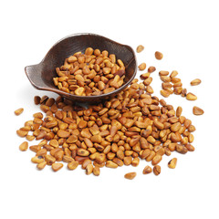 Pine nuts on white background