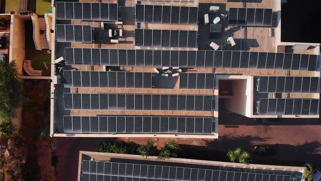 Rooftops with Solar Panels Aerial view Drone footage over Rooftops with Solar Panels