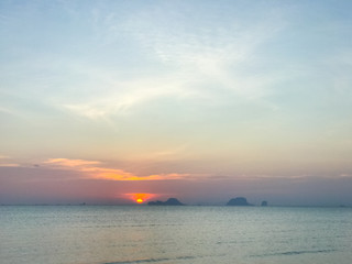 Sky over the beach and the boat before sunset