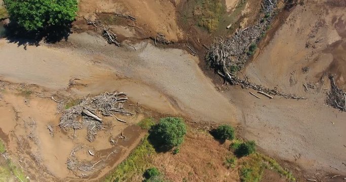 landslides and soil erosion on a mountain side due to heavy rain and deforestation