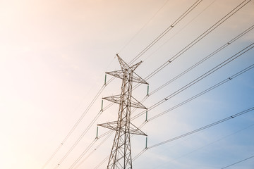 High voltage post tower with blue sky