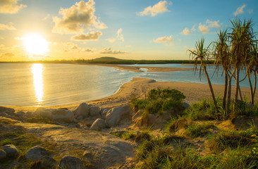 Dramatic sunrise on East Woody beach an iconic tourist popular place in Nhulunby a township on the...