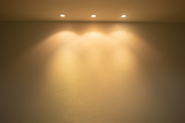 ceiling projector warm lights on wall . - obrazy, fototapety, plakaty