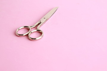 sewing scissors on colorful background