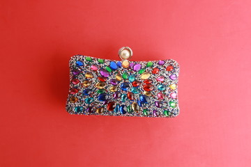 woman's bag, with bright colored stones