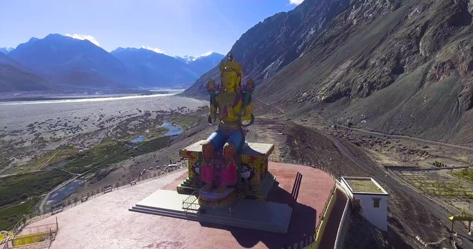 birds-eye view of Maitreya buddha statue in diskit Monastery.//Drone Shot