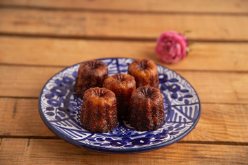 French pastry Caneles de bordeaux rum and vanilla flavor thick caramelized..