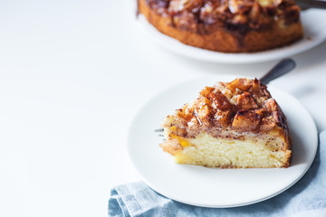 white background with a piece of apple pie