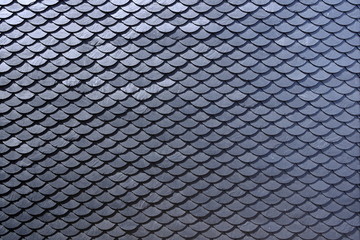 Aged slate roof tiles close-up