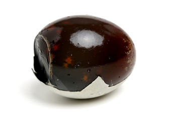 preserved duck eggs on white background