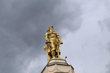 Photo of a beautiful Soviet statue with a helm