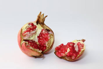 Fresh pomegranate on white background.