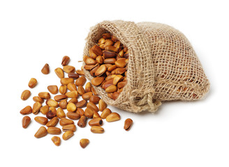 Pine nuts on white background 