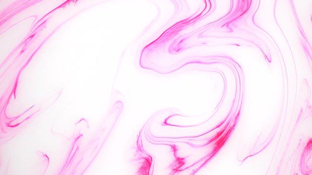 Stains of pink and white ink on the water. Abstract colored background, psychedelic footage. Fluid design for motion graphics.