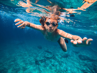 Girl swimming in the sea