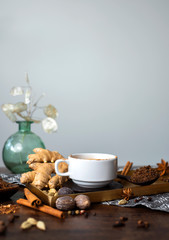 chai tea spices, chai tea latte with ginger root, cinnamon, cardamom pods, star anise, whole...