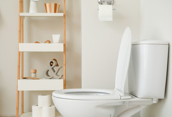 Obraz na płótnie Canvas Modern ceramic toilet bowl in interior of restroom