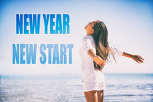 New Year 2019 resolution. New Start well-being happy Asian woman feeling free, happy emotion. Girl with open arms in happiness on summer beach vacation.