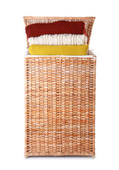 Basket with laundry on white background