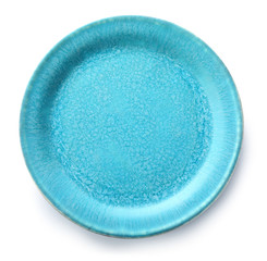Empty ceramic plate on white background