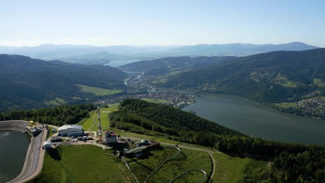 A view from Gora Zar to Zywieckie lake in Beskidy, Poland. Popular tourist attraction with pumped storage hydroelectricity, fenicular railway, air sports and ski slopes.