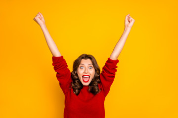 Photo of curly wavy trendy overjoyed excited rejoicing girlfriend with her hands up screaming with...