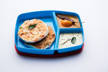 uttapam / uthappam sambar chutney in lunch box or tiffin