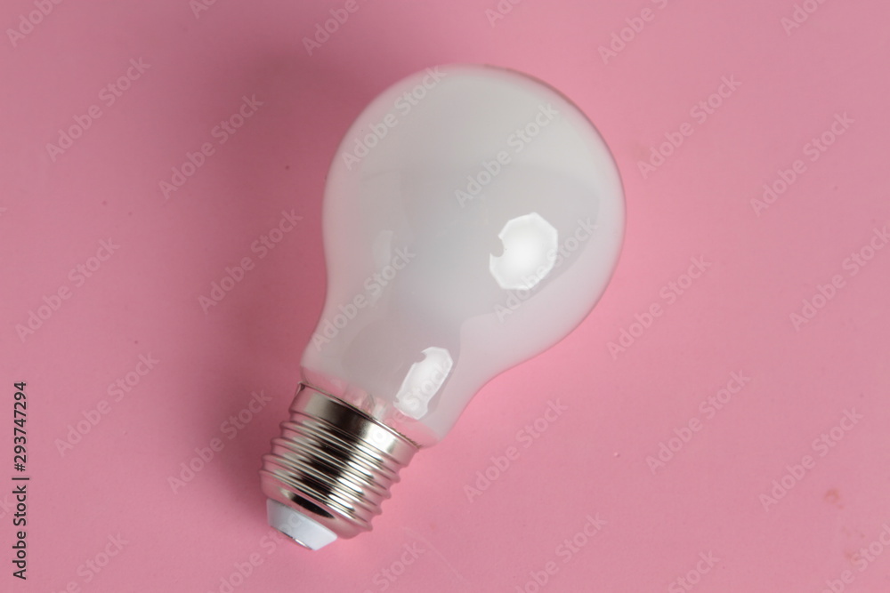 Wall mural light bulb on colorful background