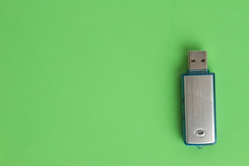 Side view of silver USB memory stick  on white