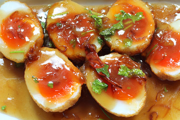 Close-up Fried Eggs with Sweet Sauce