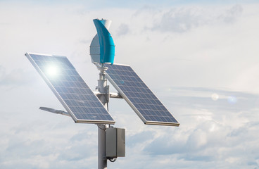Solar panels on a pillar; Photovoltaic modules for green energy innovation for life. With a...