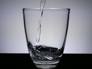 Fill the glass with water.