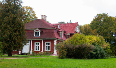 Fototapeta na wymiar Ungurmuiza Manor old manor in red-white colors