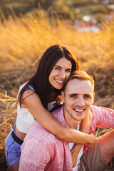 Lovely couple are happy. Genuine emotions by the young family