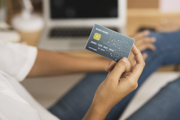 Hand showing a credit card mock up