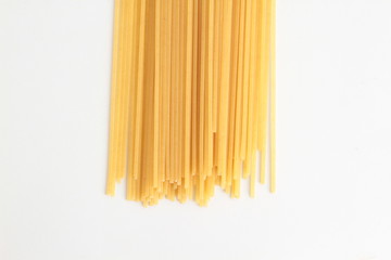 raw spaghetti pasta in colorful background