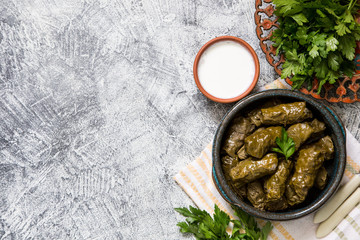 Traditional dolma  (sarma) in grape leaves with copyspace. Lebanon turkish greek middle eastern...