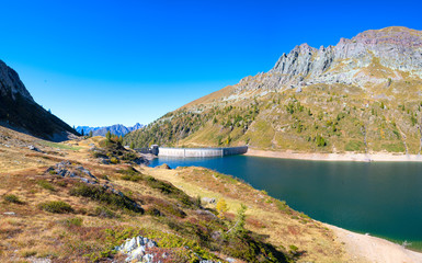 Naklejka na ściany i meble The lake Colombo dam with the Becco lace in the Brembana valley orobie Alps